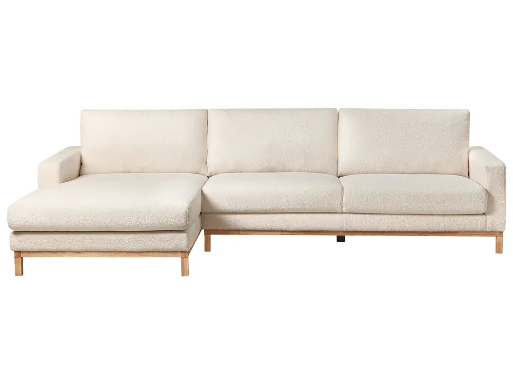Beige sectional sofa on a white background