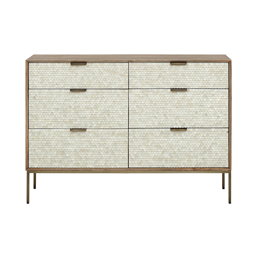 Dresser with textured front panels and gold accents on a white background