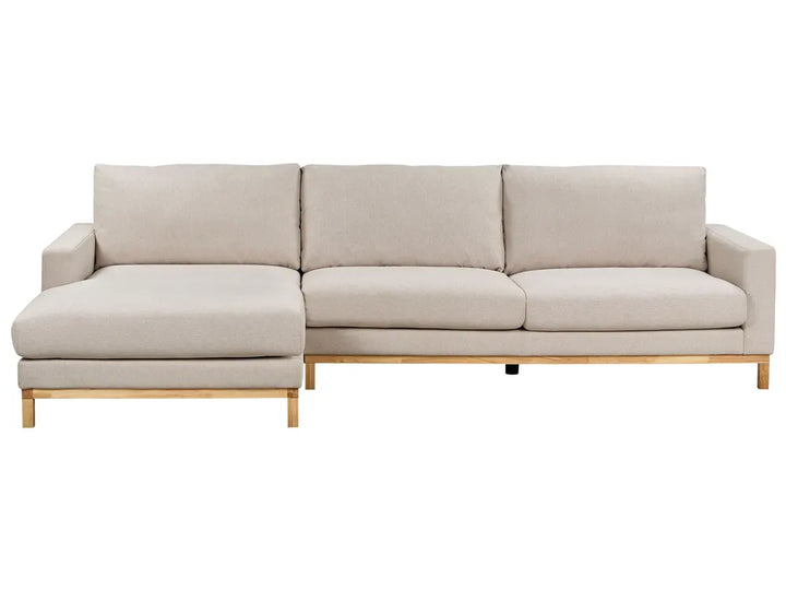 Beige sectional sofa on a white background
