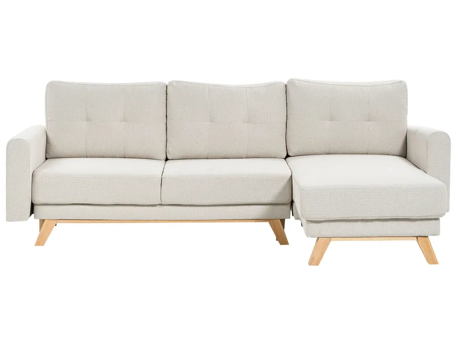 Beige sectional sofa on a white background