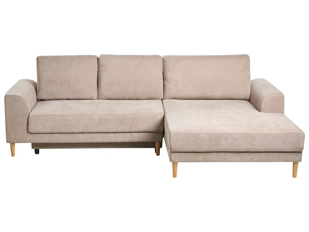 Beige sectional sofa on a white background