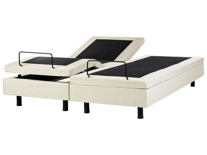 White adjustable bed base with black mattress on a white background