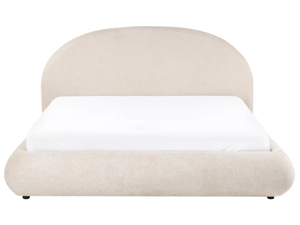 Beige upholstered bed with white mattress on a white background