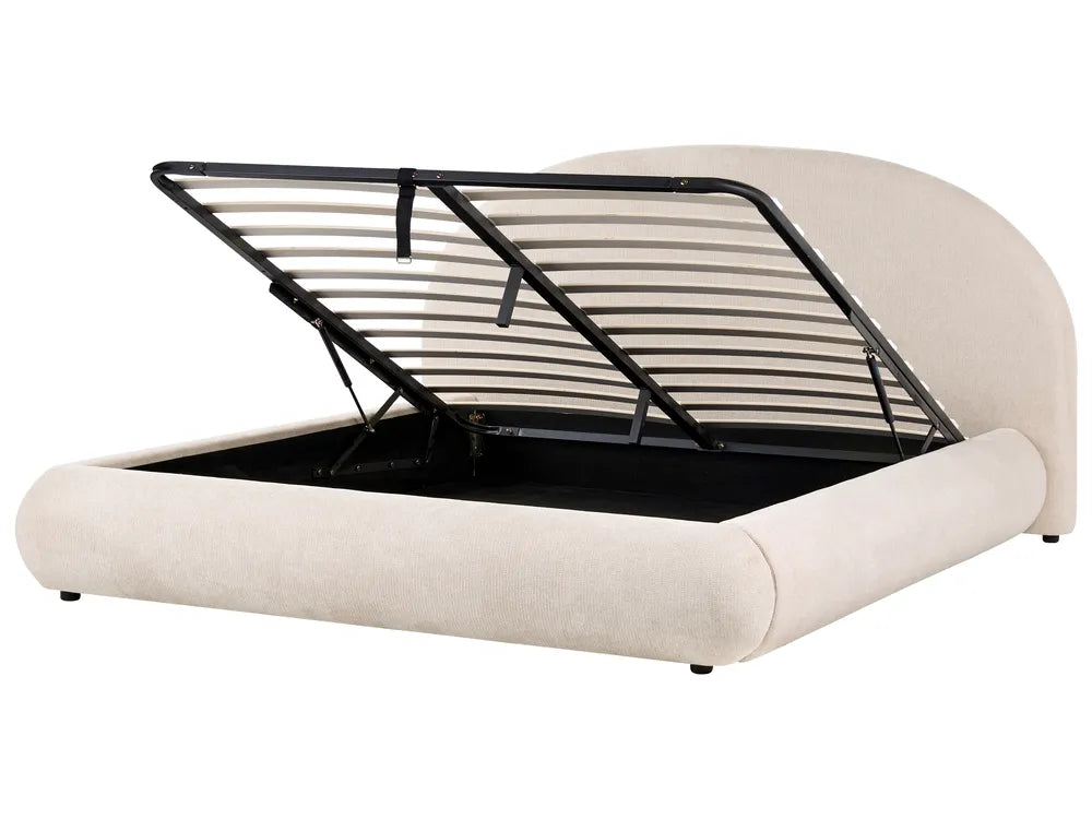 Beige bed with black metal frame on a white background
