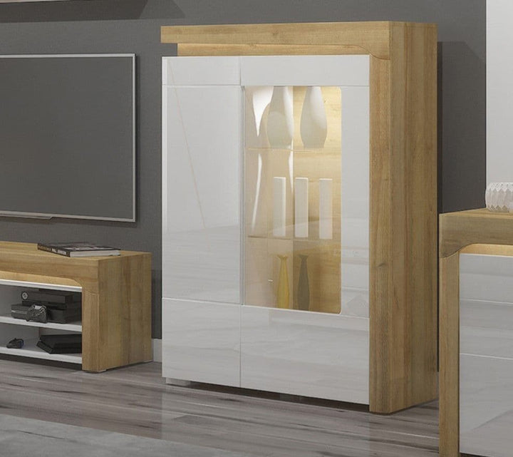 Wooden cabinet with glass panels in a room setting