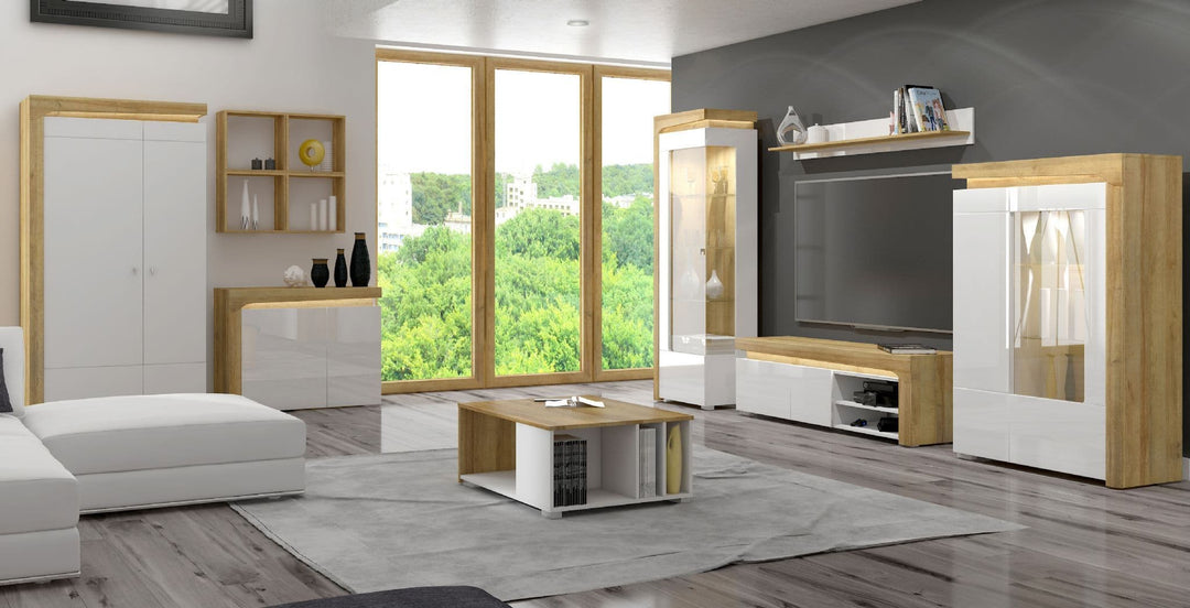 Modern living room with white and wood furniture, large window, and outdoor view.