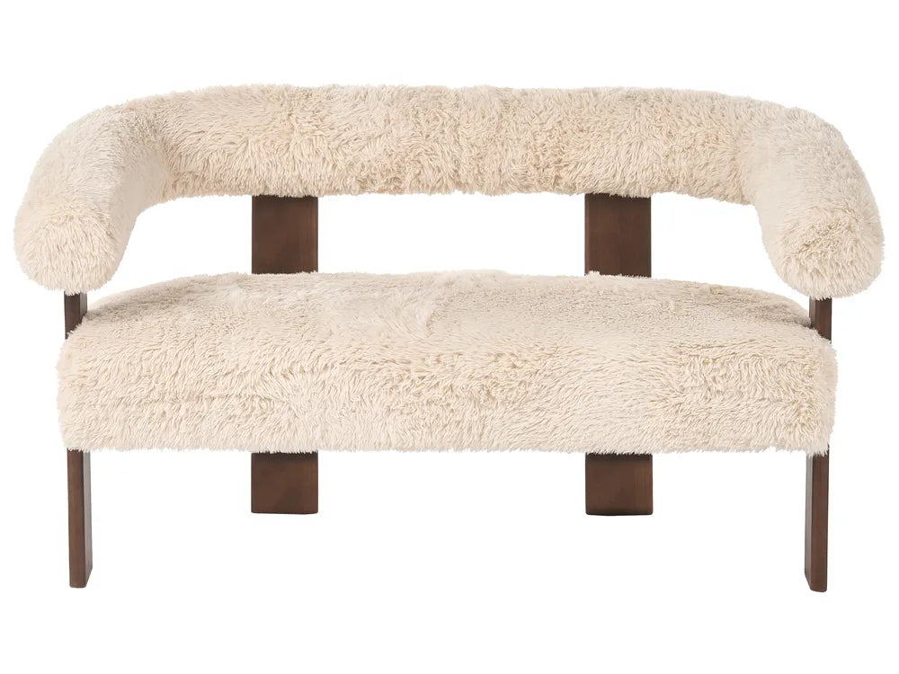 Beige furry bench with wooden legs on a white background