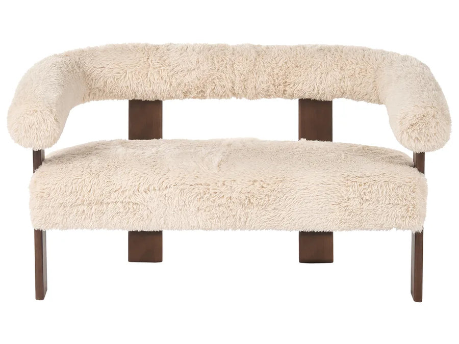 Beige furry bench with wooden legs on a white background