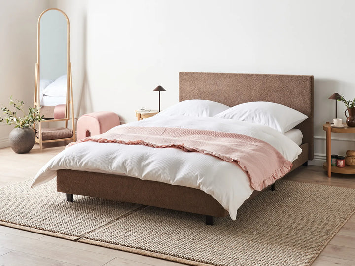 brown boucle bed with slatted base