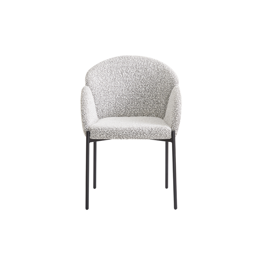 Modern chair with textured backrest and seat on a white background