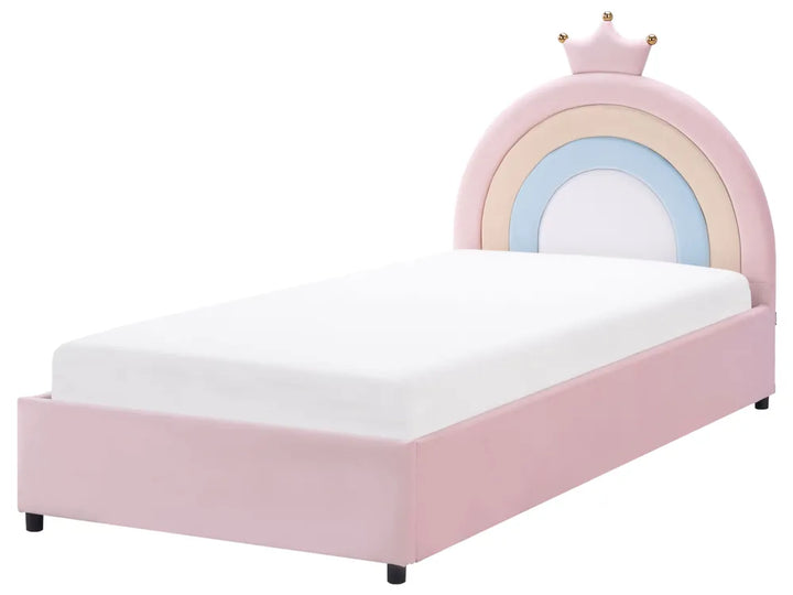 Pink children's bed with rainbow design and crown on a white background