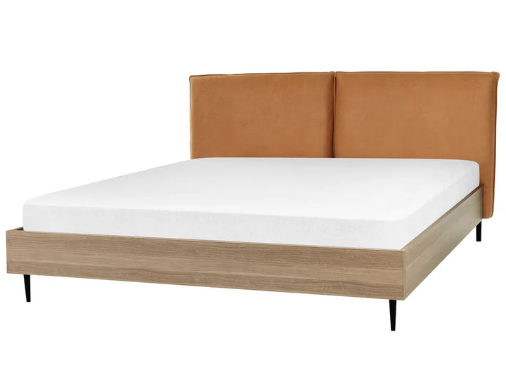 Bed with brown upholstered headboard and wooden frame on a white background