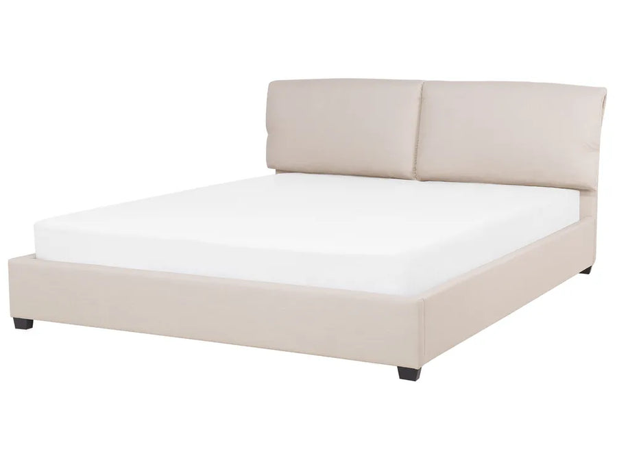 Beige upholstered bed with white mattress on a white background