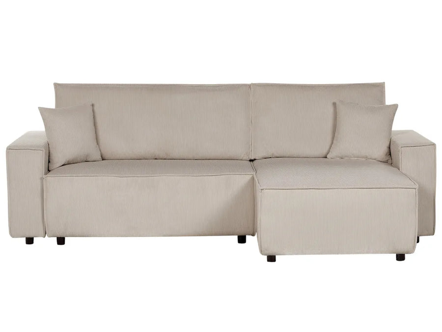 Beige sectional sofa with chaise on a white background