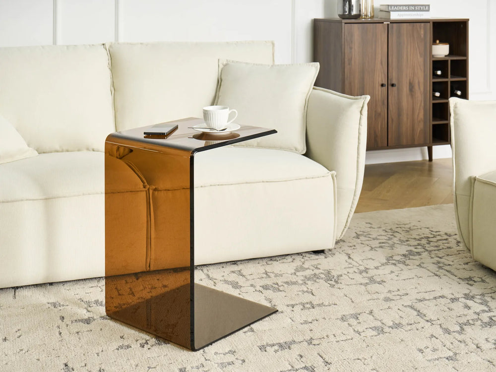 Modern living room with a white sofa and a stylish side table.