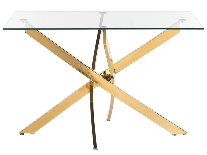 Glass table with gold metal legs on a white background