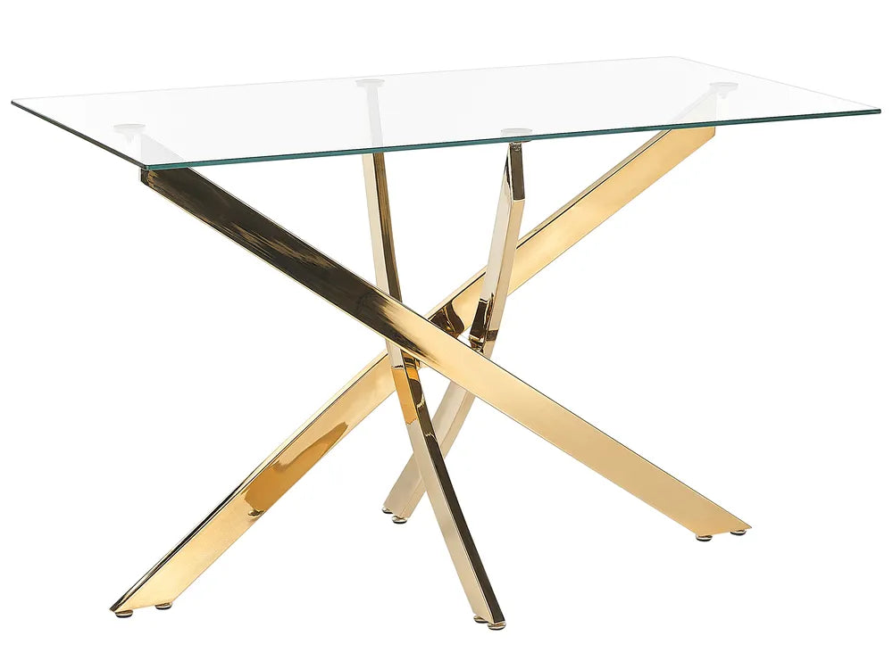 Glass dining table with gold and black metal legs on a white background