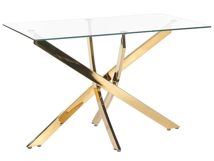 Glass dining table with gold and black metal legs on a white background