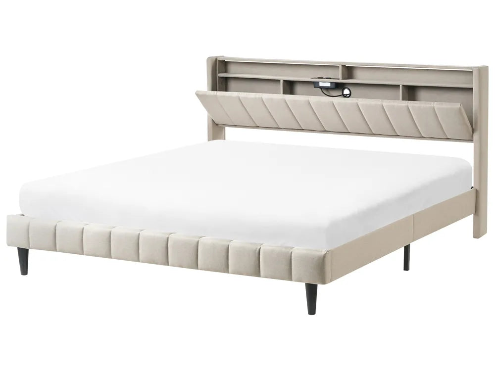 Beige upholstered bed with storage drawers on a white background