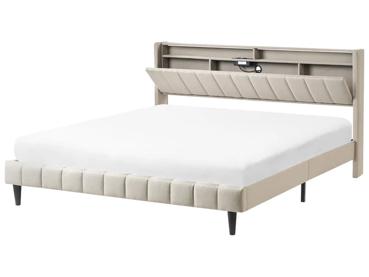 Beige upholstered bed with storage drawers on a white background
