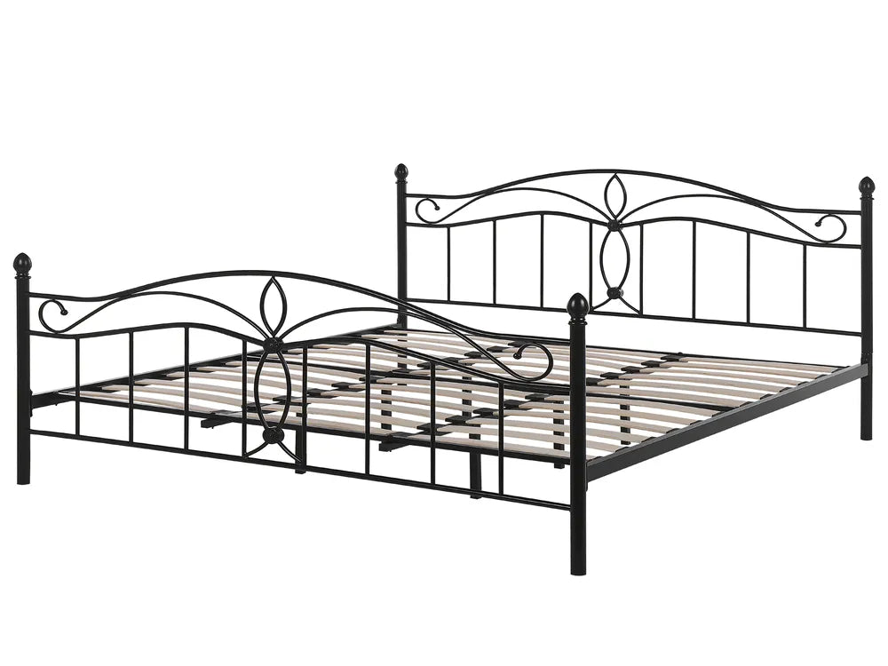 Black metal bed frame with decorative headboard on a white background