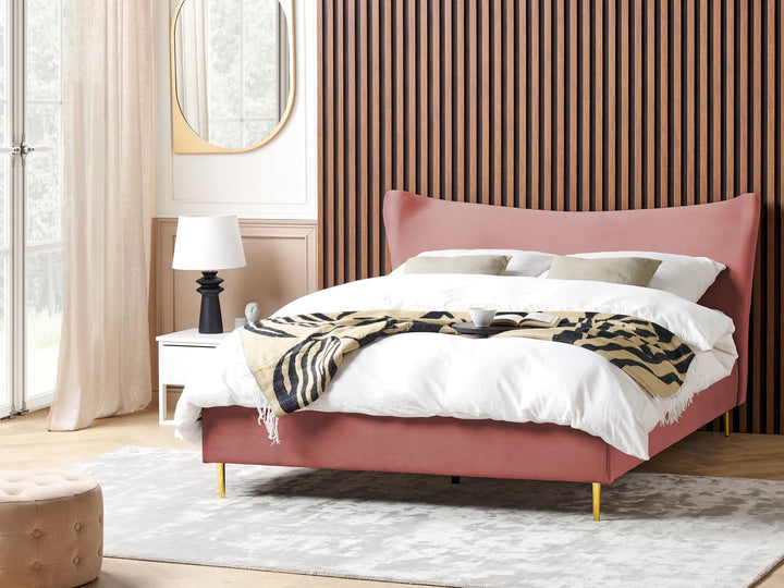 Velvet bed with golden legs pink