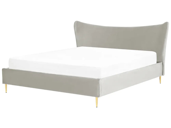 Gray upholstered bed with white mattress on a white background