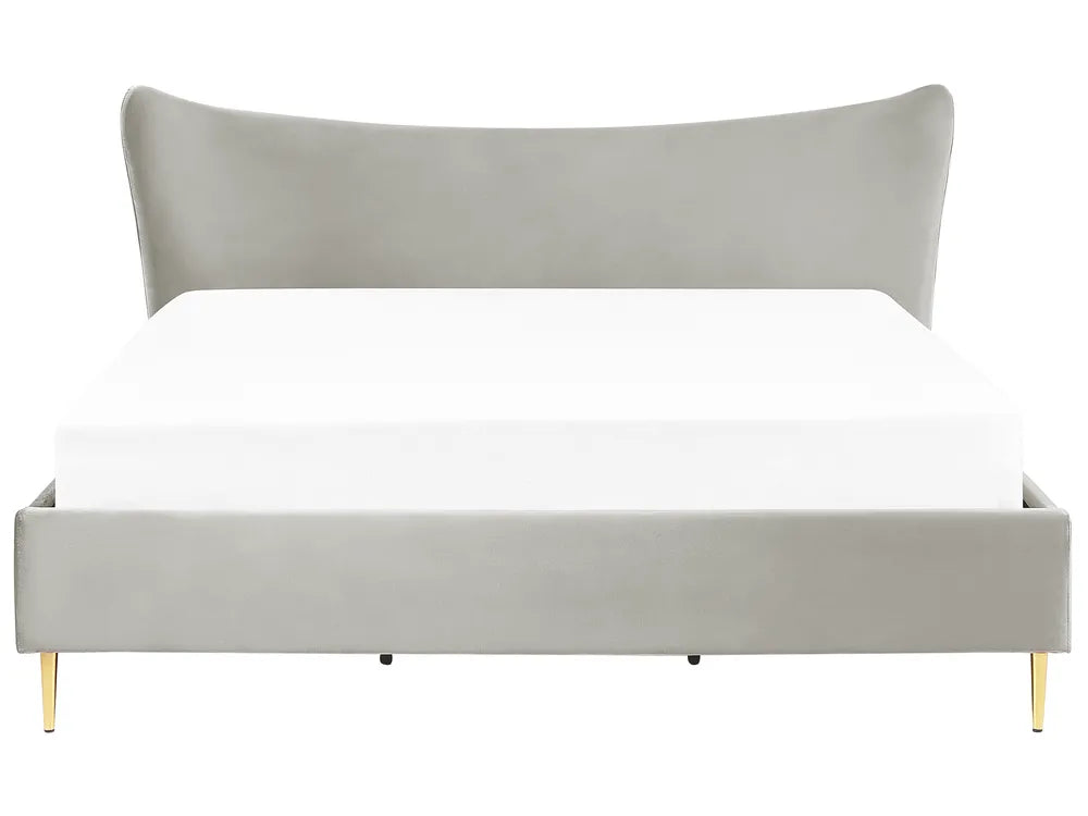 Gray upholstered bed with white mattress on a white background