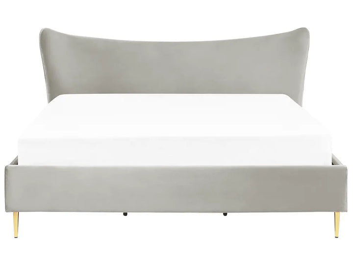 Gray upholstered bed with white mattress on a white background