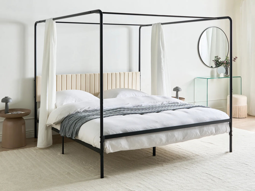 Canopy bed with upholstered headboard