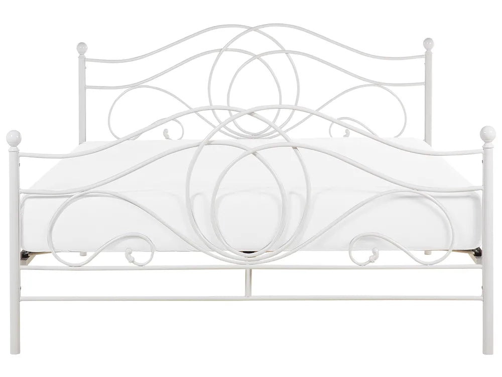 Decorative white metal headboard on a white background