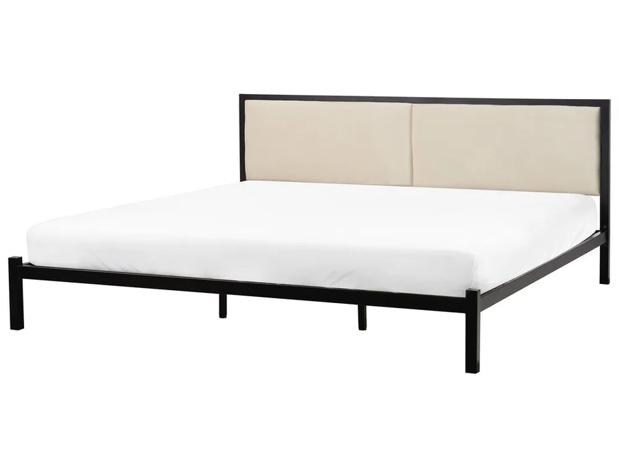 Bed with black frame and beige headboard on a white background