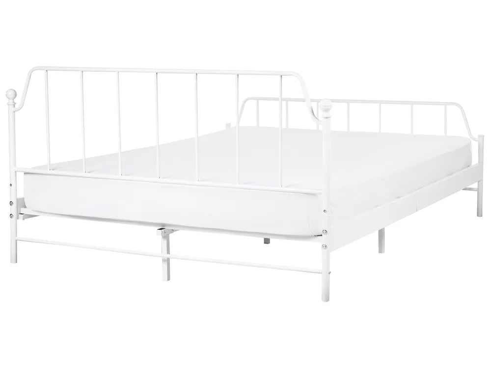 White metal bed frame with mattress on a white background