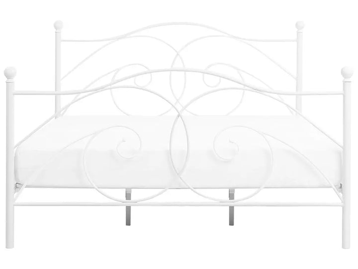 Decorative metal headboard with circular designs on a white background