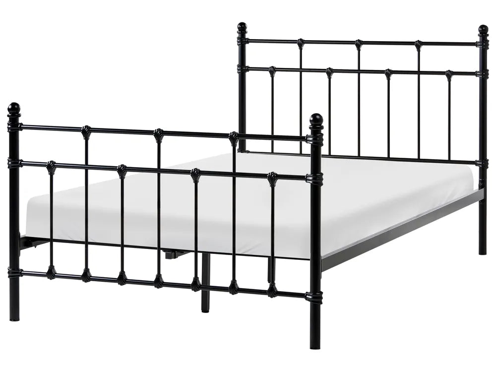 Black metal bed frame with mattress on a white background