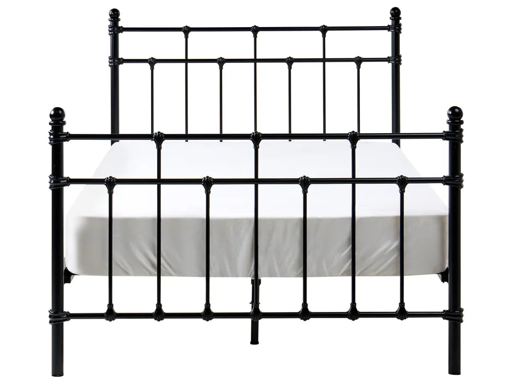 Black metal bed frame with white mattress on a white background