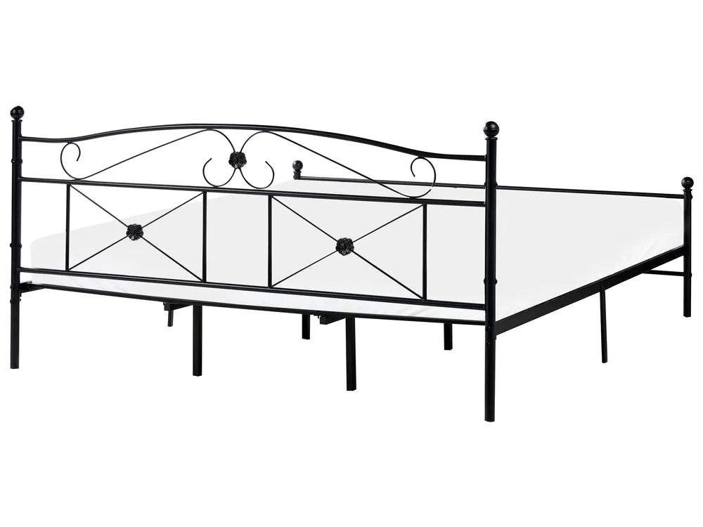 Decorative metal bed frame on a white background
