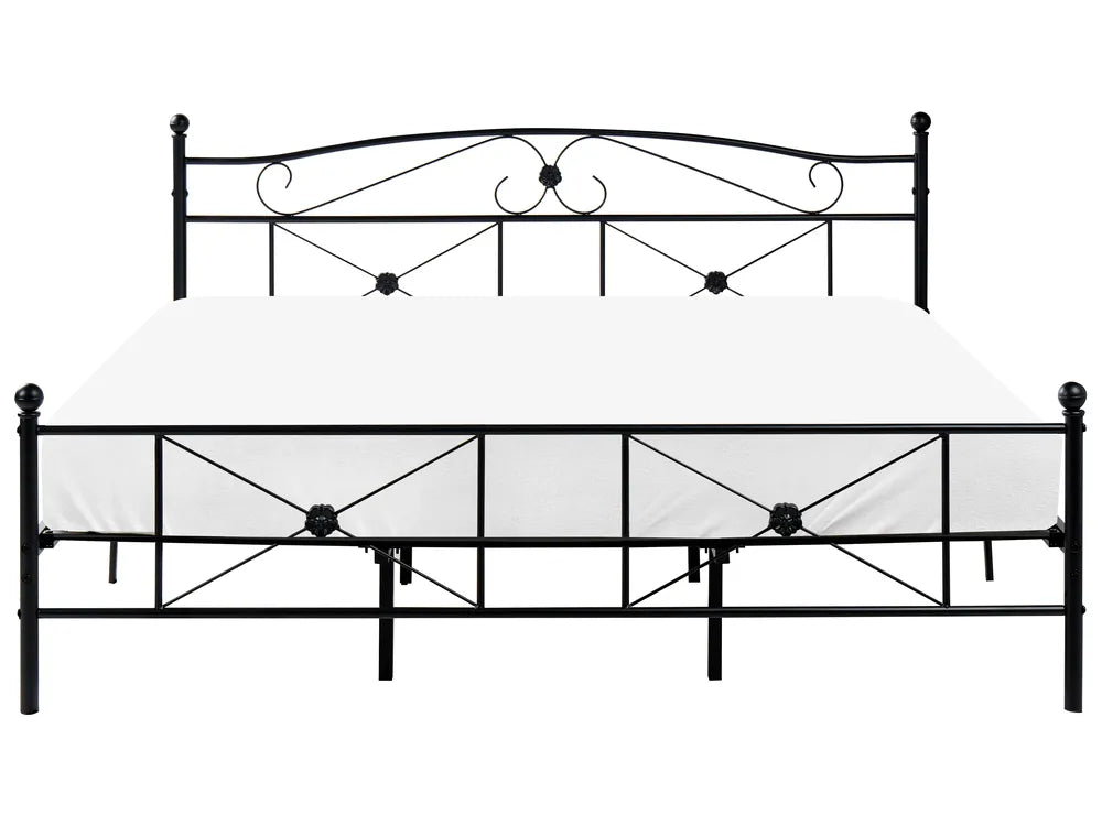 Black metal bed frame with decorative headboard on a white background