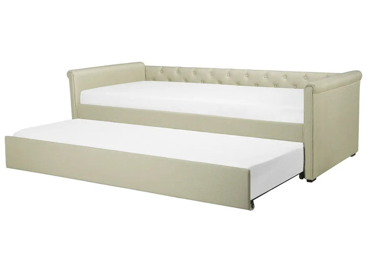Beige daybed with white mattress on a white background