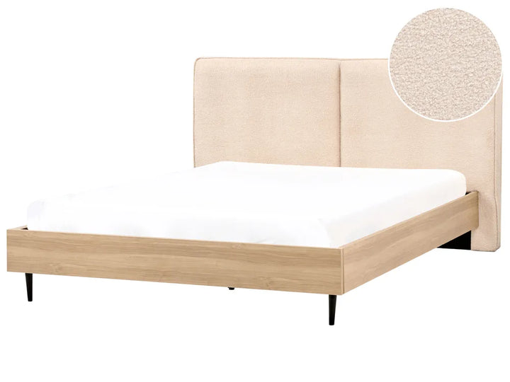 Beige bed frame with white mattress on a white background