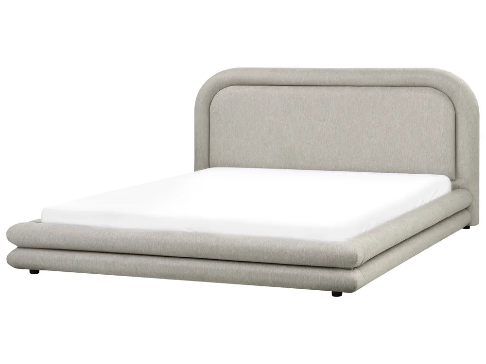 Gray upholstered bed with white mattress on a white background