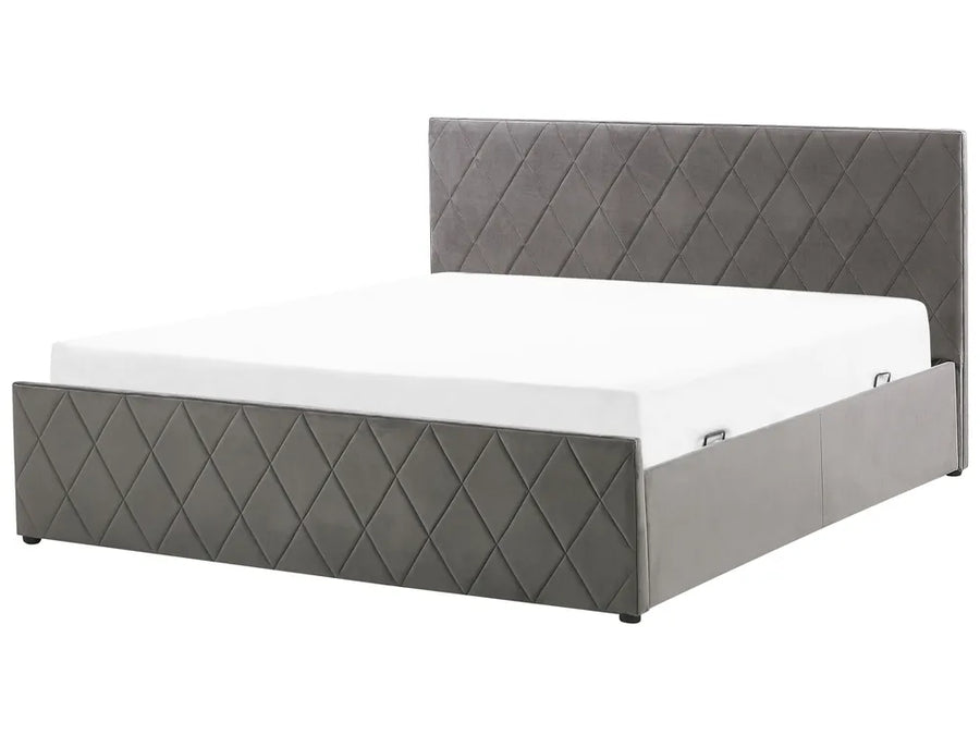Gray upholstered bed with white mattress on a white background