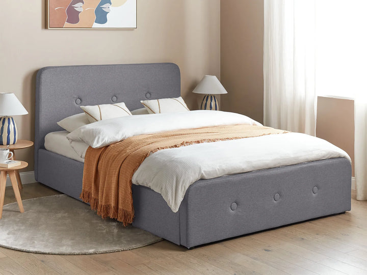 Upholstered bed with tufted headboard and lift-up base