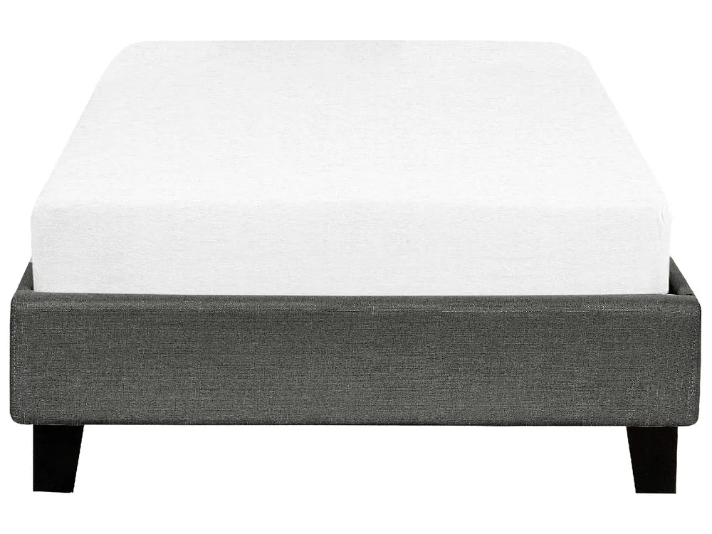 Gray upholstered bed frame with a white mattress on a white background