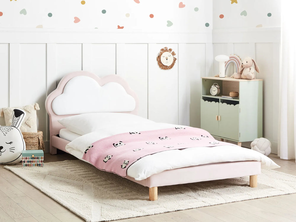 Children's bedroom with a pink bed and decorative wall.