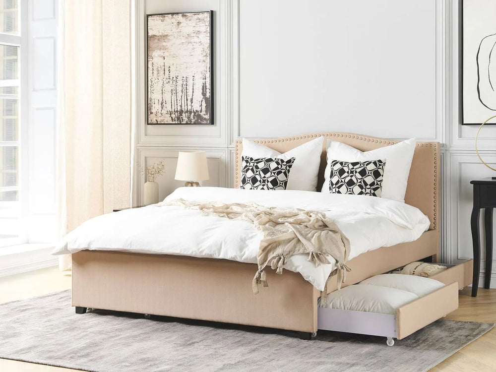 Upholstered bed with camelback headboard and drawers