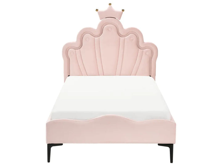 Pink bed with a crown design on a white background