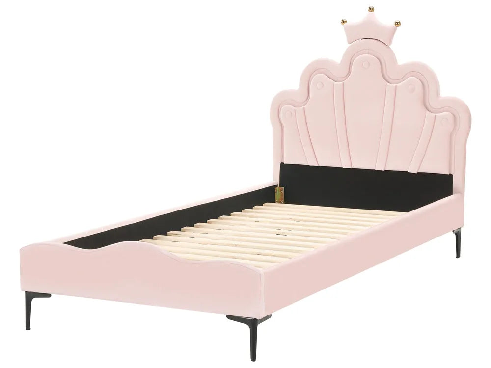 Pink bed with a decorative headboard and black mattress on a white background