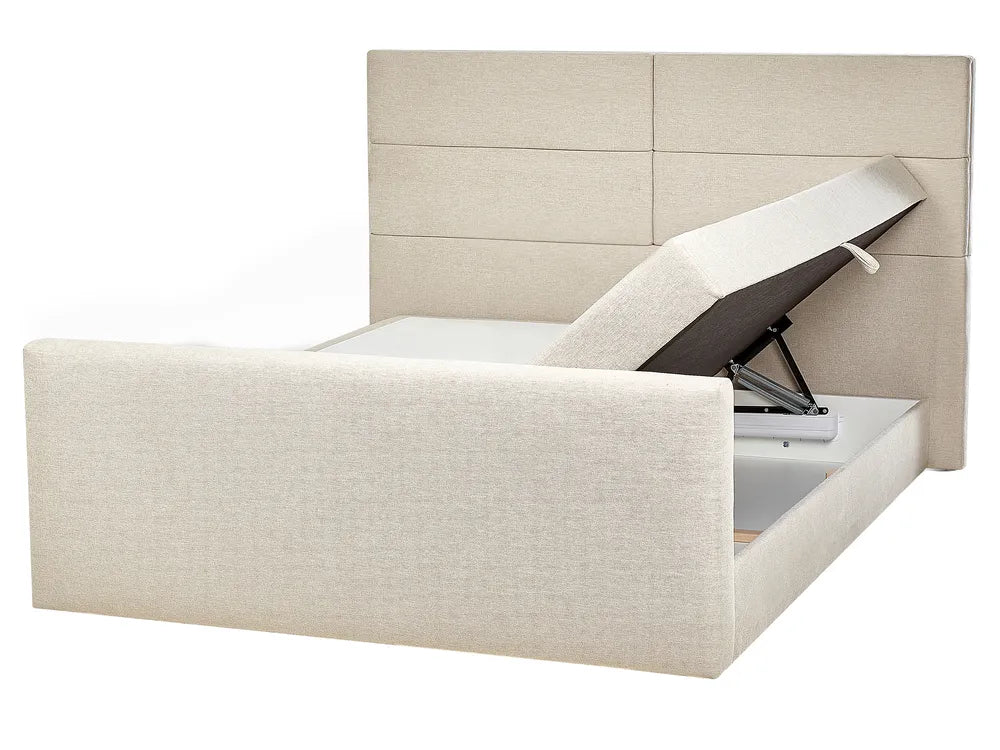 Beige upholstered bed with storage compartment on a white background