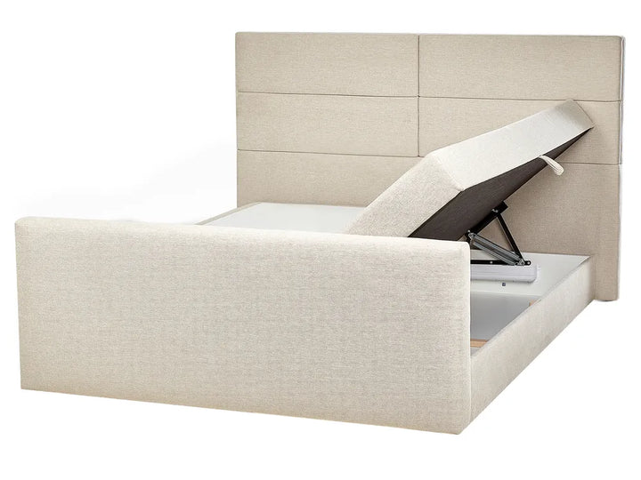 Beige upholstered bed with storage compartment on a white background